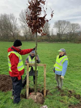 Members of Blackpool Civic Trust helping with tree planting at Grange Park