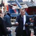 TSSA General Secretary Manuel Cortes hands out leaflets against plans to reduce staff