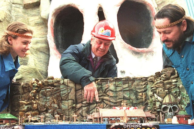 Pleasure Beach Project Manager David Mercer points out the model of the new Valhalla ride to Sergi Volov Russian team leader and his son Laroslav in1999
