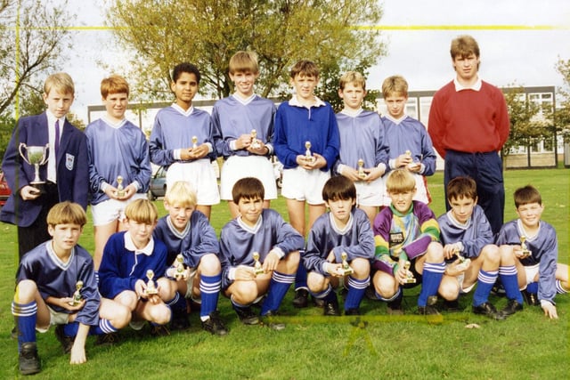 Kirkham Carr Hill's victorious U12 football team in 1992. They won a share of the Harry Wynne Trophy in a competition involving all 16 schools on the Fylde coast. Carr Hill beat Collegiate, Highfield and St George's to reach the finals, despatched Millfield 4-3 on penalties in the semi-final, and decided to share the trophy with Hodgson when the score in the final remained at 1-1 after extra time