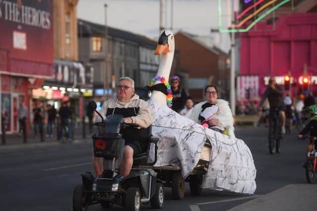 Mobility scooters are allowed to join in the fun of Blackpool's Ride the Lights