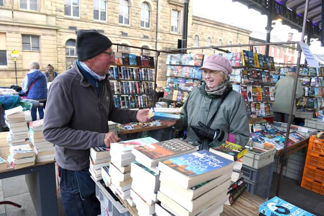 Derek Walsh on Derek's Books stall, Preston Market