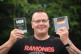 Kevin J. Wood has won a songwriting award