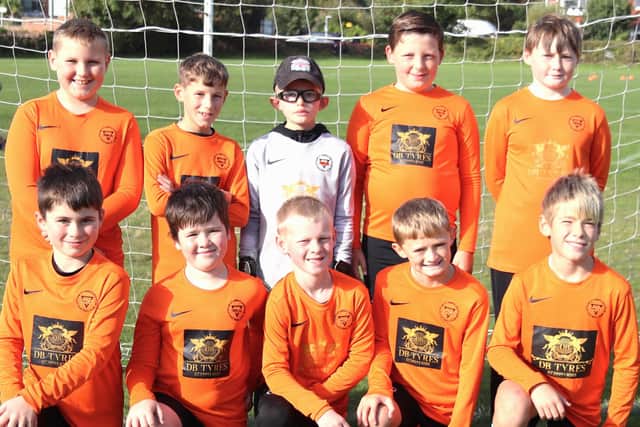 The YMCA Orange U10 squad Picture: Karen Tebbutt