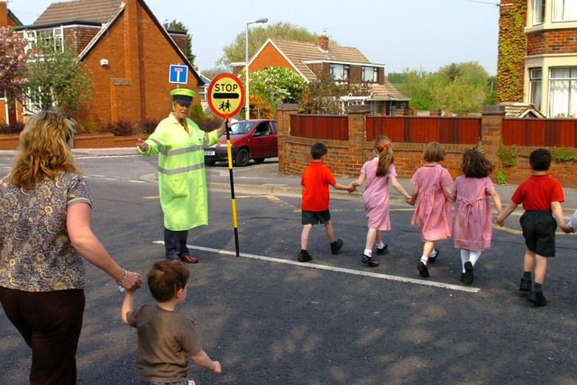 Lollipop Lady Bridie Matley outside our Lady of the Assumption Catholic Primary School, Blackpool, 2006
