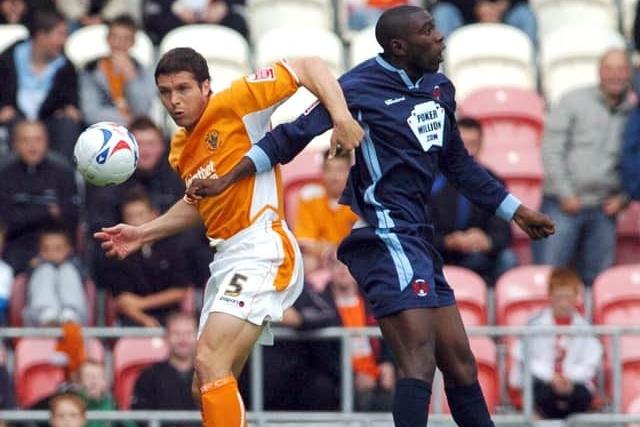Michael Jackson against Leyton Orient wearing the 2006/07 shirt sponsored by Point Bet