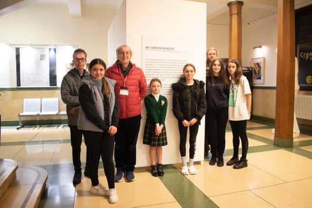 Youth worker Dave Blacker with some of the youngsters during their visit to the exhibition.