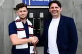 Director of football Chris Beech (right) welcomes latest signing Owen Evans to AFC Fylde