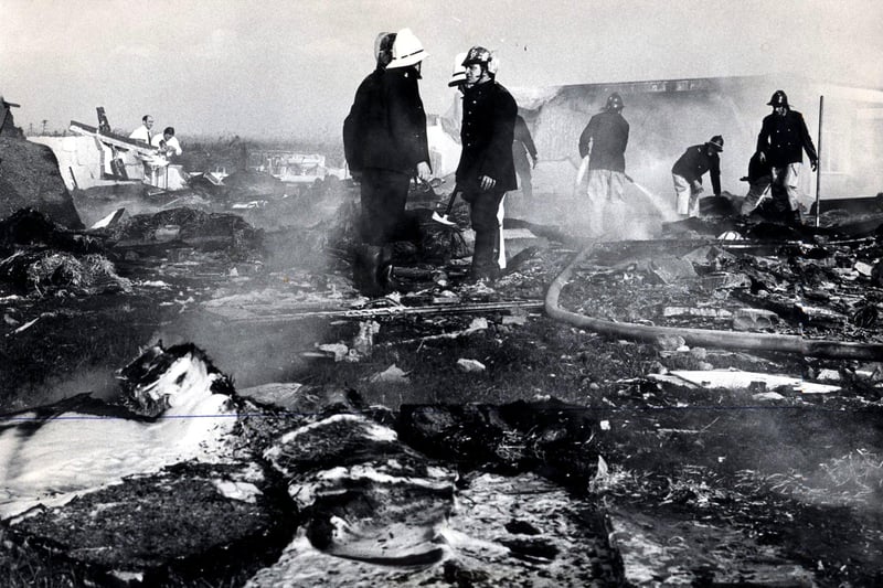 Firemen search among the smoking wreckage of Pontins Aircrash