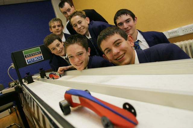 Hodgson High School's Jaguar F1 team school challenge with carbon dioxide powered cars. Pictured are Adam Leveridge Graphic Designer, Mark Luxton Manufacturing Engineer Kieron Moss Resources Manager. Second Row Left to Right: Tom Bowden Team Manager, Nick Bryer Graphic Designer, David Bracegirdle Design Engineer and Teacher Mr Grundy