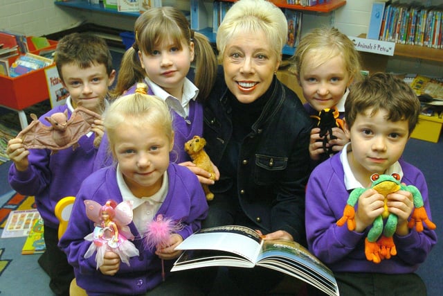 Elaine Fossett (chairman of community services - Rotary Club of Blackpool South) storytelling at Thames Primary School, Blackpool, with pupils, (from left) Clayton Addison,  Rachel McKenna, Jennifer Maycock, Emma Griffin, and Oscar Wilkinson