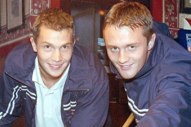 Blackpool FC players Phil Barnes (left) and Phil Robinson swapped their boots for cues, when they joined in the pool challenge at the Wheatsheaf Hotel in 1999