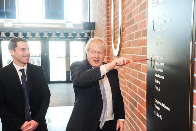 Prime Minister Boris Johnson and Blackpool South MP Scott Benton during a visit to the Winter Gardens in February