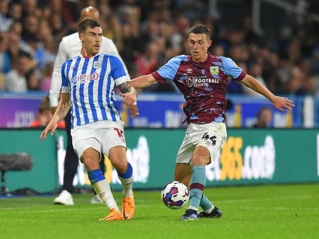 Burnley's Dara Costelloe battles with Huddersfield Town's Josh Ruffels

The EFL Sky Bet Championship - Huddersfield Town v Burnley - Friday 29th July 2022 - Kirklees Stadium - Huddersfield