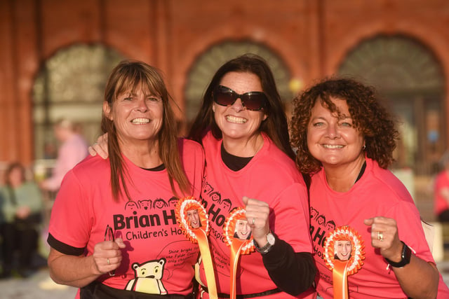 This trio were eager to do their bit for Brian House in the Blackpool Night Run.