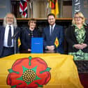 The signing of Lancashire's devolution deal in November - but has the election turned the smiles to uncertainty?  [From left] Blackburn with Darwen Council leader Phil Riley, Lancashire County Council leader Phillippa Williamson, Levelling Up Minister Jacob Young and Blackpool Council leader Lynn Williams (image: Martin Bostock Photography)