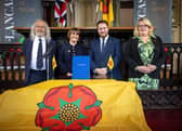 The signing of Lancashire's devolution deal in November - but has the election turned the smiles to uncertainty?  [From left] Blackburn with Darwen Council leader Phil Riley, Lancashire County Council leader Phillippa Williamson, Levelling Up Minister Jacob Young and Blackpool Council leader Lynn Williams (image: Martin Bostock Photography)