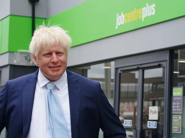 A wax figure of Boris Johnson appeared outside a job centre in Blackpool (Credit: PA Media)