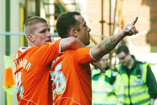 Charlie Adam celebrates with Keith Southern after scoring during a 3-1 home win against Nottingham Forest. The result saw Ian Holloway's men close in on a play-off spot...