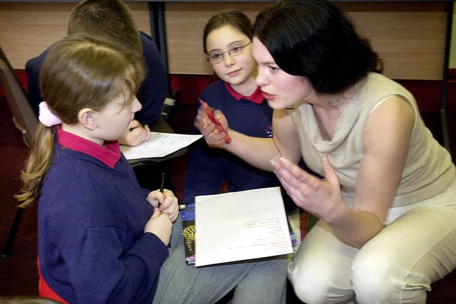 Local performance poet Shelley Dwornik helped St John's Primary School pupils to create their own poems as part of World Book Day in 2003.