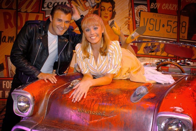 Jonathan Wilkes and Suzanne Carley appeared in Grease as Danny and Sandy at the Blackpool Opera House in 2004