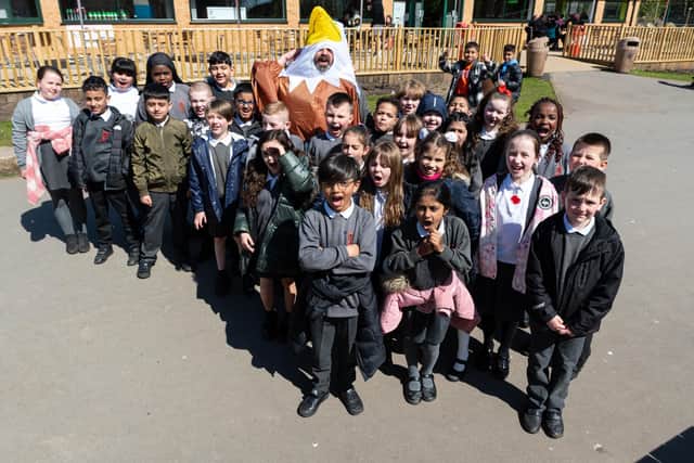 Blackpool Gazette reporter Richard Hunt dressed up as the seagull deterrent at Blackpool Zoo drew attention from these school pupils from Yew Tree Community School in Oldham. Photo: Kelvin Stuttard