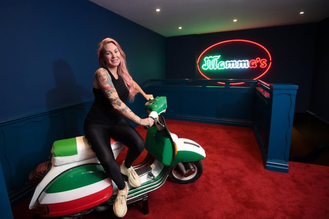 Claire Martin shows off the new Vespa scooter, handy for diners wanting to take photos