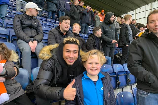 Harry with Blackpool FC player Jordan Lawrence-Gabriel
