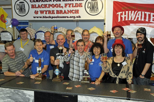 Some of the bar staff at the first Blackpool Beer and Cider Festival, held at Blackpool FC