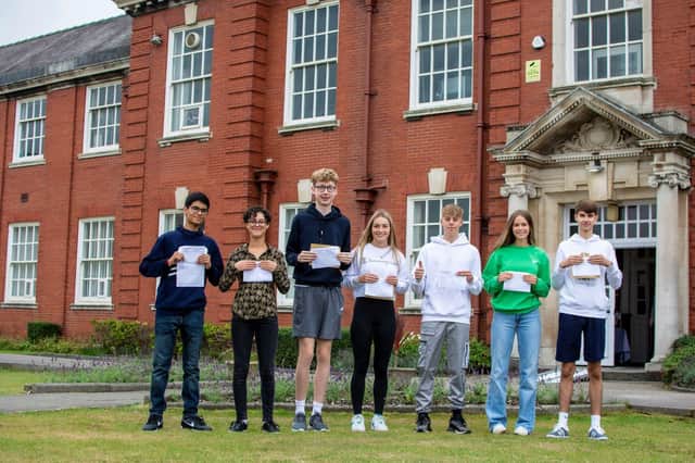 Pupils at AKS celebrate their GCSE results (from left): Arnav Raut, Anna Dunkow, Thomas Hoiles, Beth Ridsdale, Tom O'Hara, Olivia Merrick, Edward Hoiles.