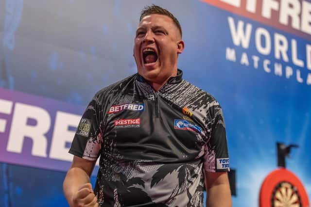 Chris Dobey withstood a late fightback to beat James Wade at the Winter Gardens Picture: Taylor Lanning/PDC