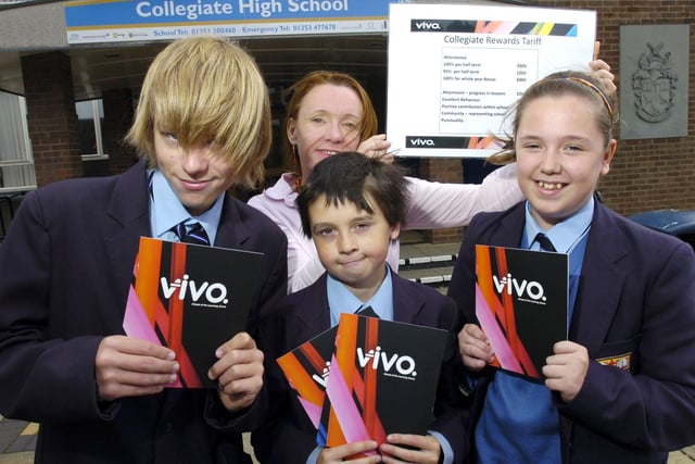 There were incentives for behaving well at Collegiate High School. Children who arrive on time, attend well and achieve good marks were awarded points which could be traded for mobile phone vouchers, shopping vouchers and other treats. Pictured are Kyle Evans, headteacher Cherry Ridgway, Kurtis Busby and Laura Pepper