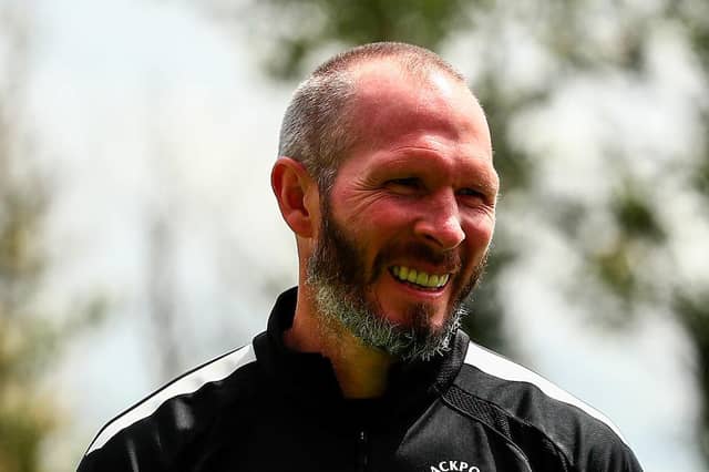 Michael Appleton's side face Premier League opposition on Sunday afternoon