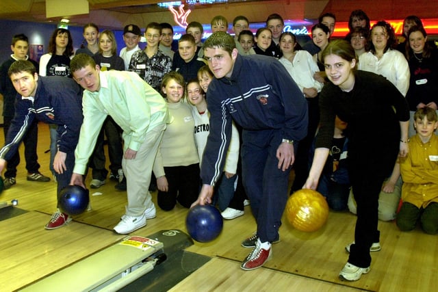Jennifer Redman and Lee Minto bowling with Blackpool FC's Steve Bushell (left) and Phil Thompson at Premier Bowl, Blackpool for anti-bullying day