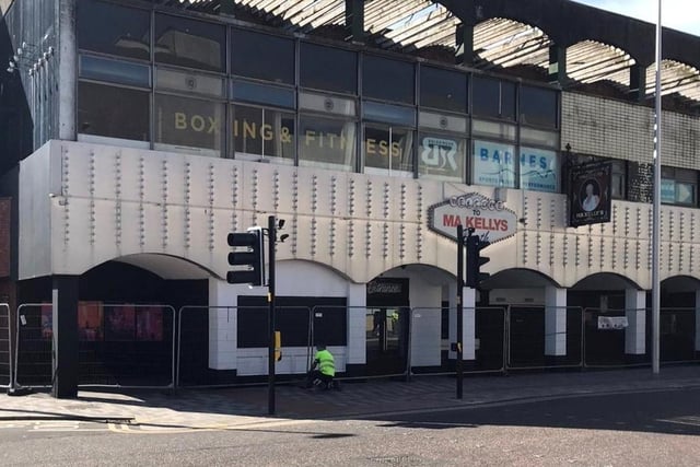 Fences were put up in parts of the town centre to stop people congregating. Pictured is Ma Kellys on the corner of Dickson Road and Talbot Road