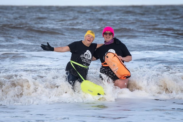 Two protesters take to the sea at Fleetwood to make a point.