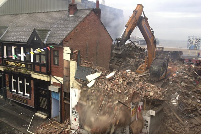 Demolition of the remains of Grab City in next to the Pump and Truncheon in 2002