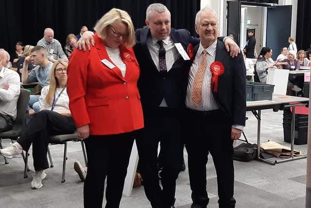 Labour group leader Lynn Williams (left) looks tense as she awaits her result