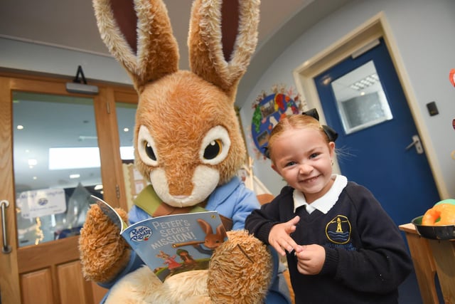 Little  Remi Marnie-Correa, aged four, is thrilled to meet Peter Rabbit after he paid a visit to Westminster Primary School in Blackpool