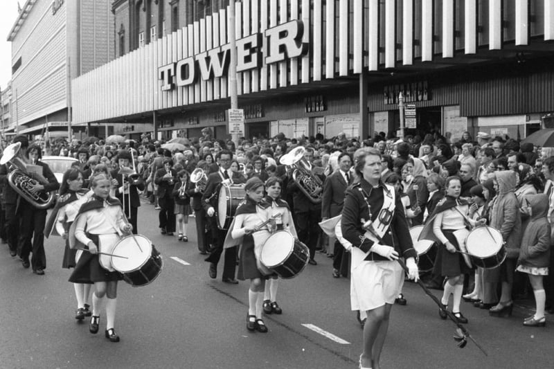 Happy birthday Blackpool! That was the message from thousands of sightseers who turned out to watch the opening procession of the resort's centenary celebrations.