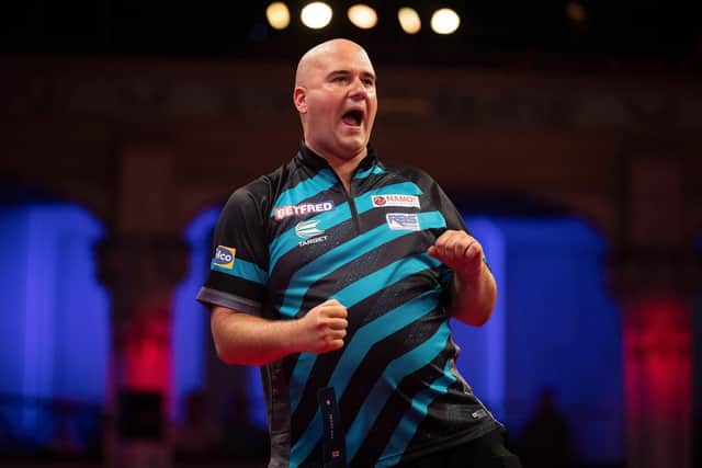 Rob Cross produced an amazing comeback to win his first-round match at the World Matchplay darts in Blackpool