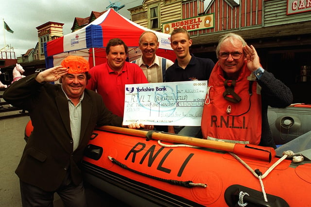 Little and Large hand over a cheque for £1,100, to RNLI crew member David Warburton, at Blackpool Pleasure Beach. Pictured are Eddie Large, Blackpool Boat AC secretary Steve Livesey and chairman Frank White, David Warburton and Sid Little, 1996