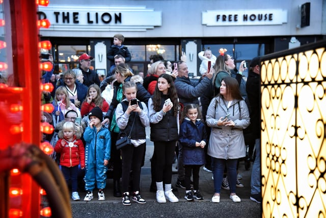Onlookers enjoying the parade.