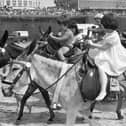 Youngsters enjoying the donkey rides on the beach at Blackpool in the summer of 1985