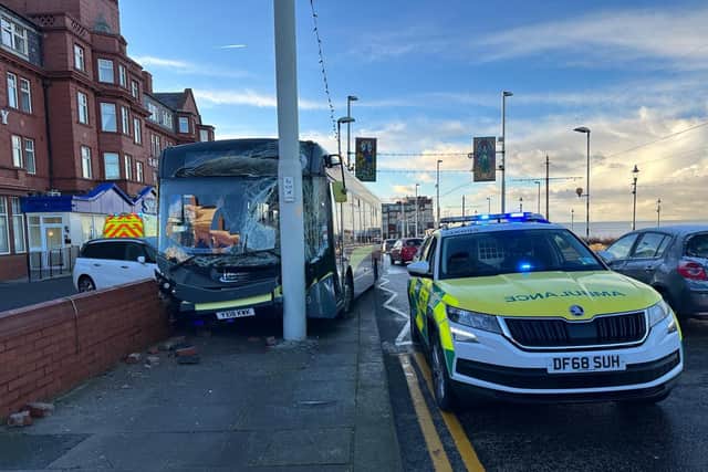 The bus appears to have struck a metal post holding one of the illuminations and knocked down a wall, shedding bricks onto the hotel car park
