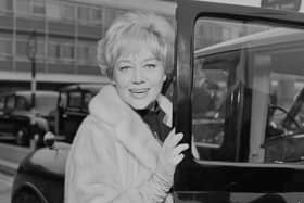 Welsh actress Glynis Johns enters a taxi at London Airport, UK, 15th May 1966.  (Photo by Daily Express/Getty Images)