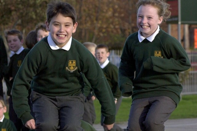 Louise McGill and William from Carleton St. Hildas CE Primary School taking part in a "jump rope for heart" activity, to raise money for the British Heart Foundation. This was in 2000