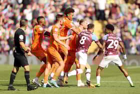 Ian Maatsen and Sonny Carey were both shown reds during last week's derby at Turf Moor