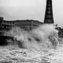 The promenade battered by huge waves - seen from North Pier - during storms