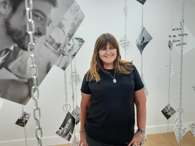 Carolyn Sillis with her art work, 'Freedom Is' at Fleetwood Market